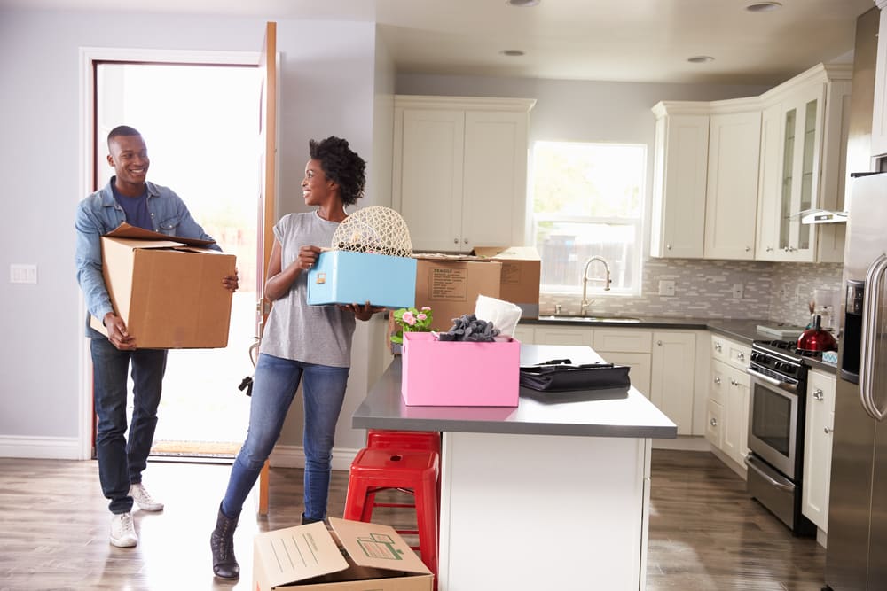 A couple moving into an apartment